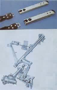 片梭（上）和片梭织机的扭轴投梭机构（下）